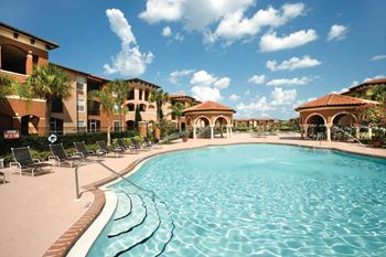 Relaxing Pool Area With Sundeck at The Palms Club Orlando Apartments, Florida, 32811-2402